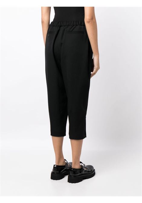 Pantaloni crop con vita elasticizzata in nero - donna COMME DES GARCONS COMME DES GARCONS | RLP0031